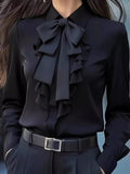 Ruffled Tie Front Long Sleeve Blouse - Hinnulus
